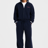 90s Sporty Jumpsuit in navy, full-length front view on male model